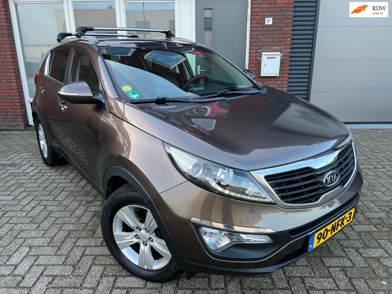 Kia Sportage - 2.0 X-ecutive Plus Pack / Pano / Leder / PDC / AUT / NAP - AutoWereld.nl