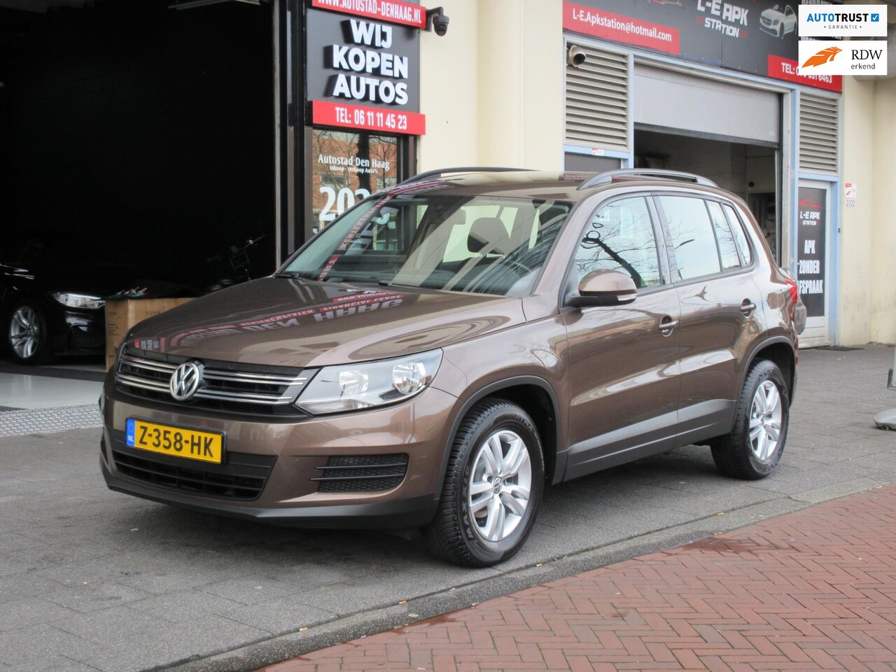 Volkswagen Tiguan - 1.4 TSI Airco Navi Carplay Trekhaak - AutoWereld.nl