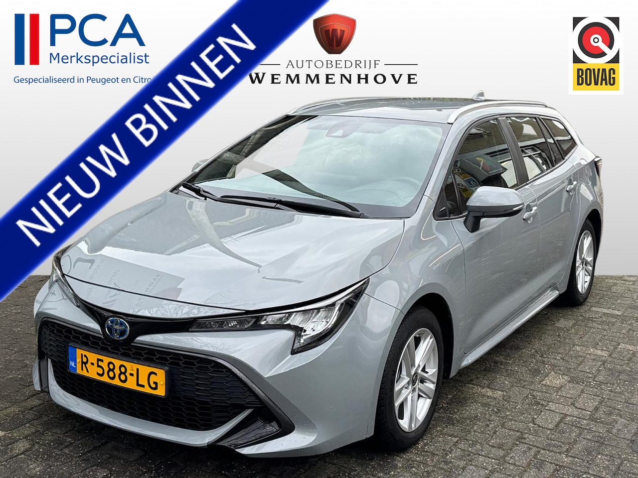 Toyota Corolla Touring Sports - 1.8 Hybrid Bus. Edition Automaat Airco/Navi/Camera/Lichtmetalen velgen - AutoWereld.nl