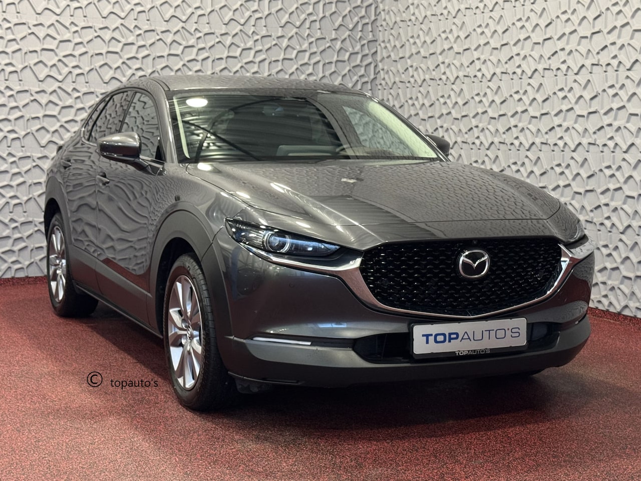 Mazda CX-30 - 2.0 E-SKYACTIV-G M HYBRID EXCLUSIVE-LINE LEER BOSE 360.CAM ELEK.STOEL HEADUP STOEL/STUUR V - AutoWereld.nl