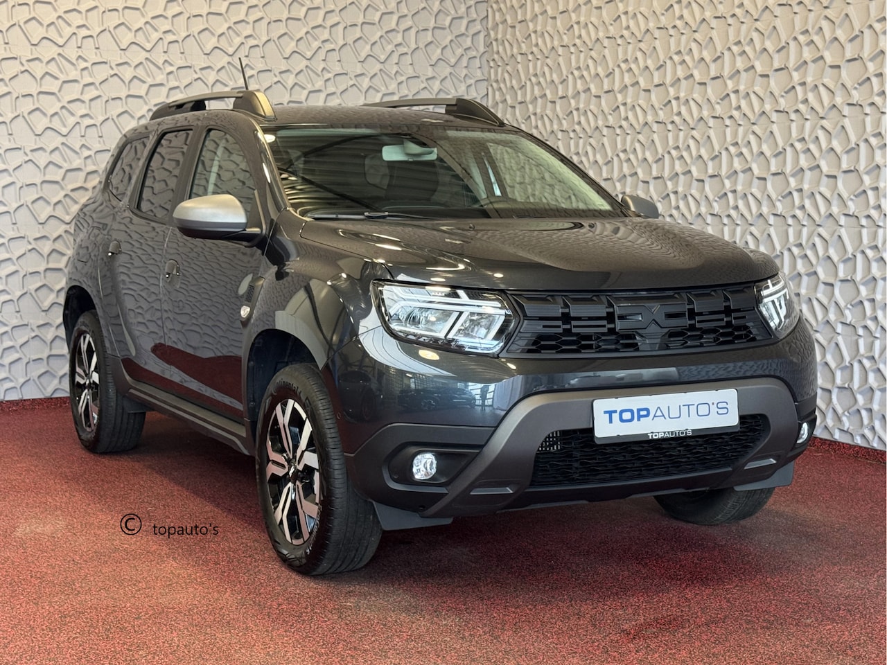 Dacia Duster - 1.3 TCe 150 NAVI CAMERA LED TREKHAAK ECC JOURNEY PDC LMV STOELVERW. - AutoWereld.nl