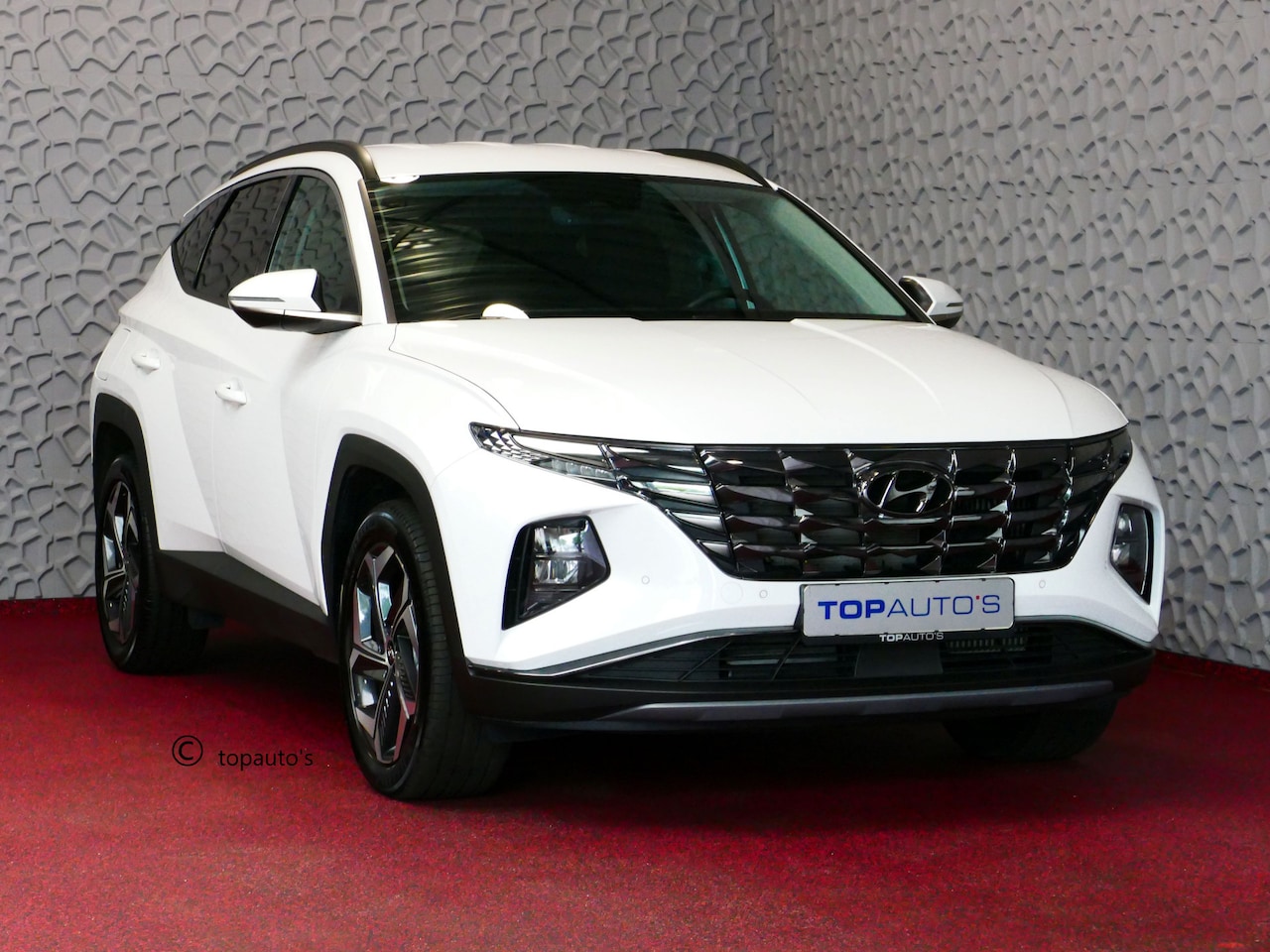 Hyundai Tucson - 1.6 T-GDI PHEV 265PK 19''LMV 4WD LED STUUR/STOEL VERW. NAVI ELEK.KLEP 12/2023 PHEV PLUG IN - AutoWereld.nl