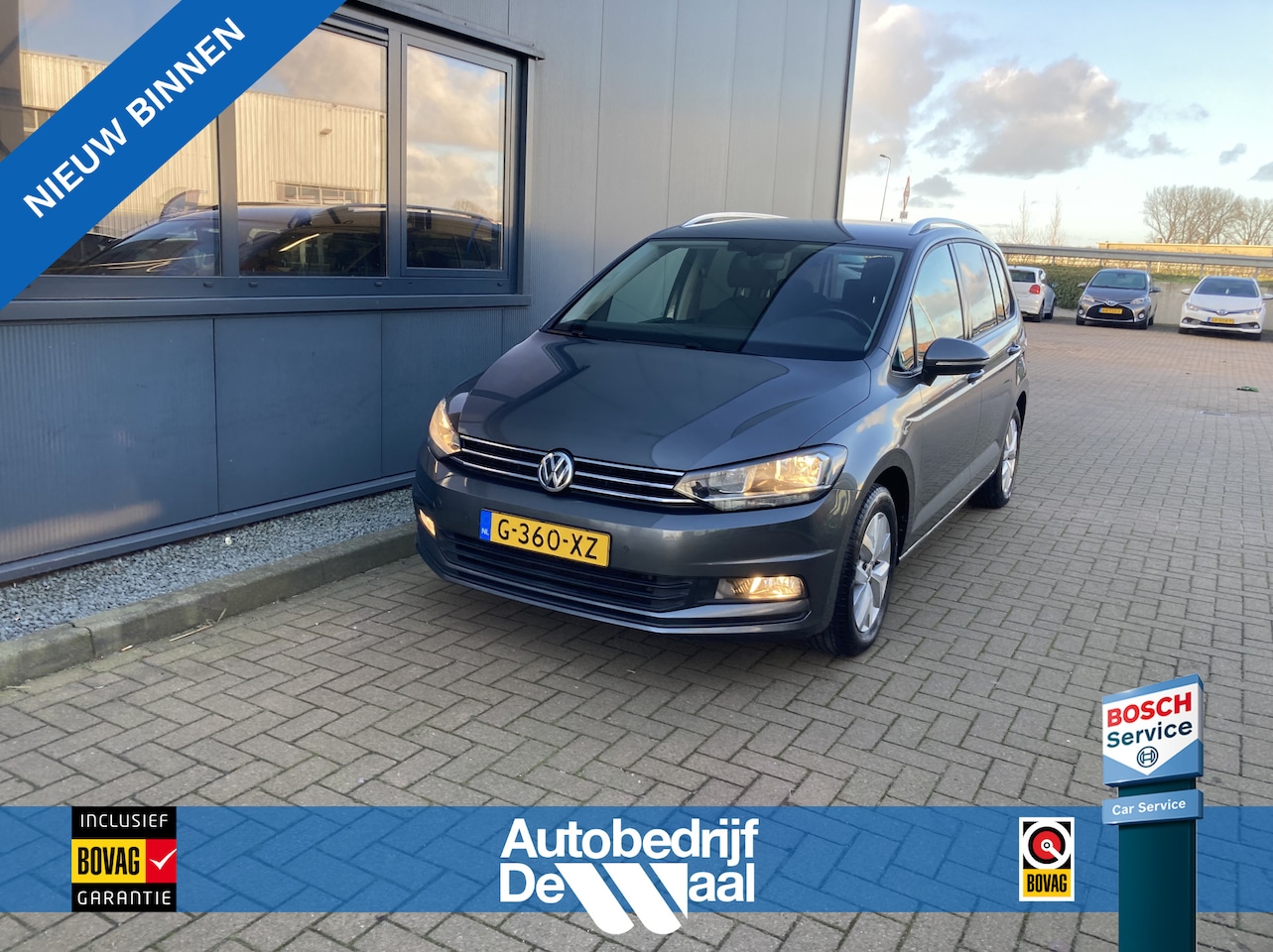 Volkswagen Touran - 1.5 TSi 150pk DSG Comfortline Business 7-pers. CAMERA/NAVI/CARPLAY/TREKHAAK/PDC/STOELVERWA - AutoWereld.nl