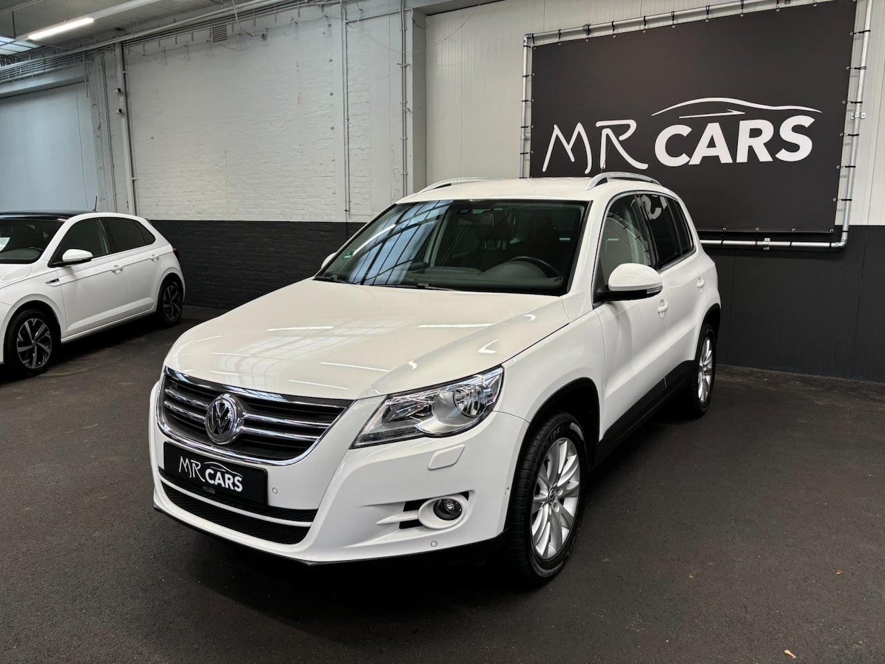 Volkswagen Tiguan - 2.0 TSI 4Motion Navi/Climate Control/Stoelverwarming. - AutoWereld.nl