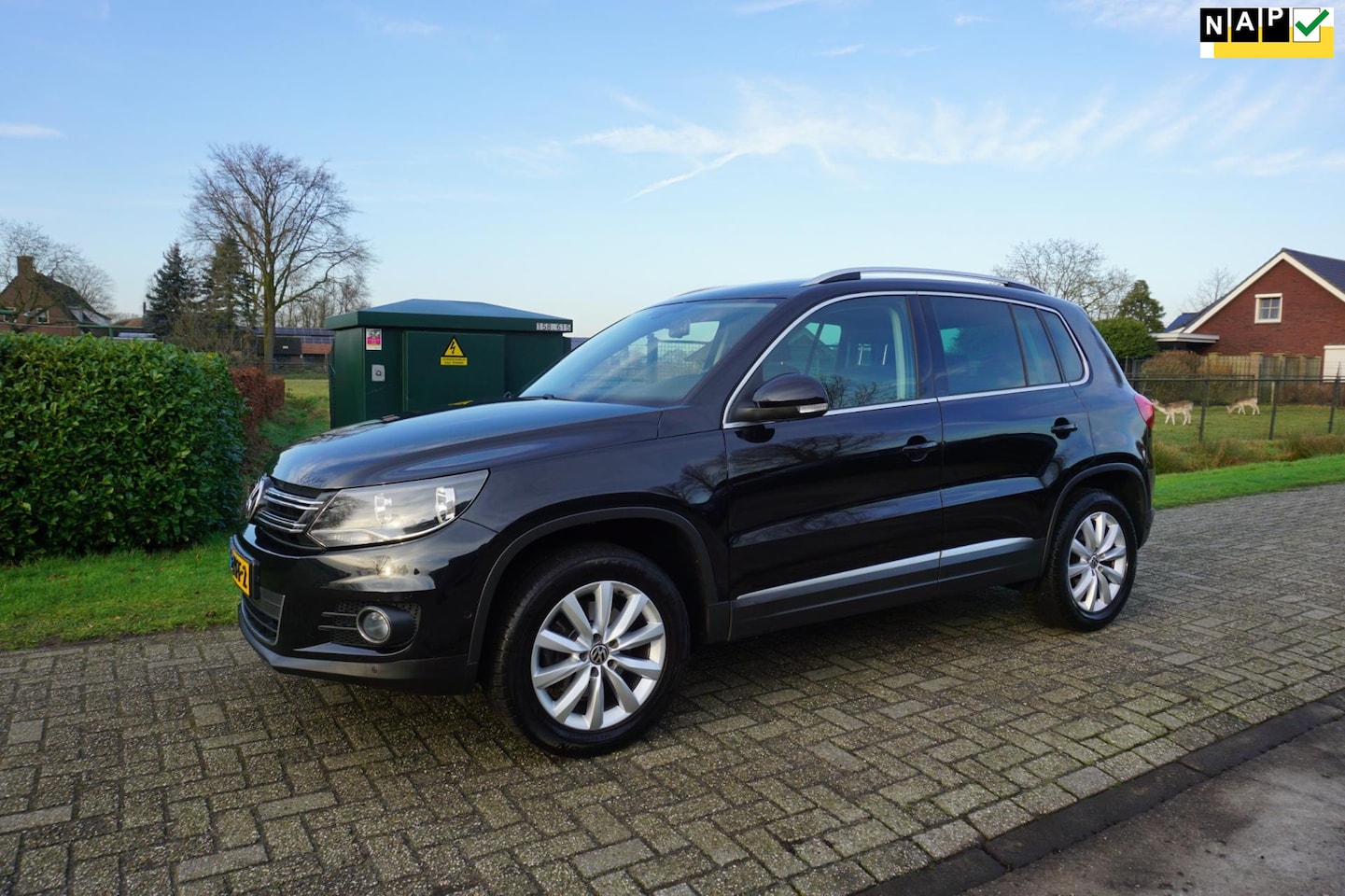 Volkswagen Tiguan - 1.4 TSI Sport&Style - AutoWereld.nl