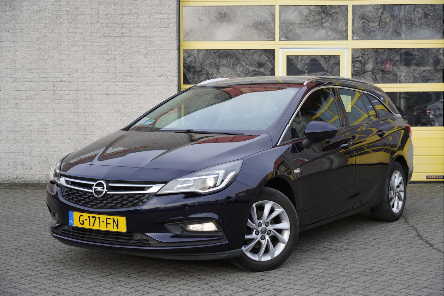 Opel Astra Sports Tourer - 1.0 Turbo Innovation BJ2019 Lmv 16" | Led | Pdc | Navi | Keyless entry | Elek. achterklep - AutoWereld.nl