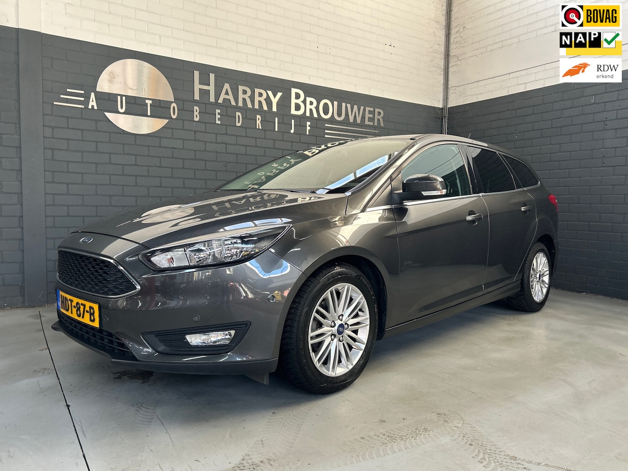 Ford Focus Wagon - 1.0 Titanium 1.0 Titanium, Nieuwe motor en koppeling met garantie - AutoWereld.nl