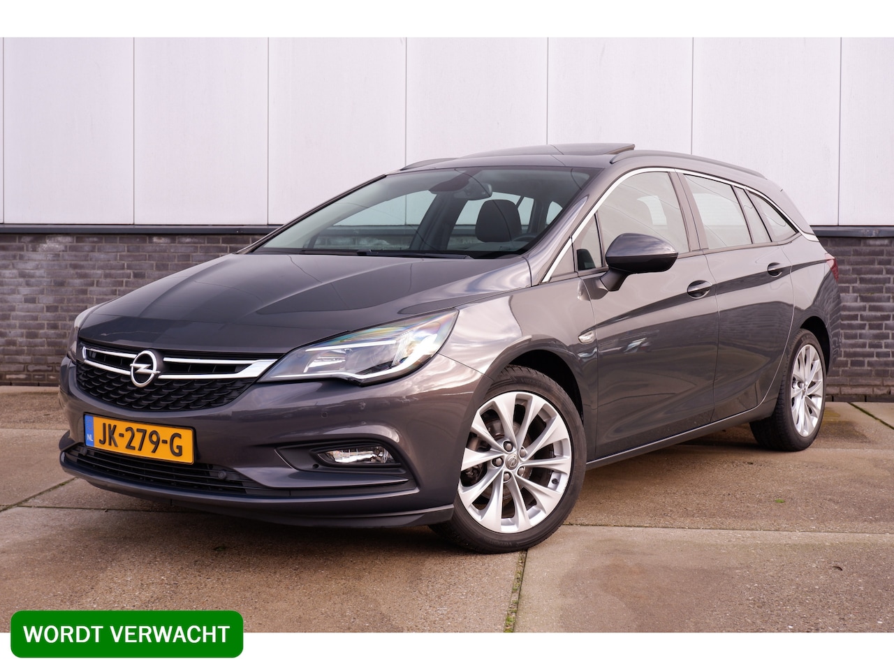 Opel Astra Sports Tourer - 1.0 Edition | Schuifdak | Trekhaak | Navi | Cruise | PDC | Carplay - AutoWereld.nl