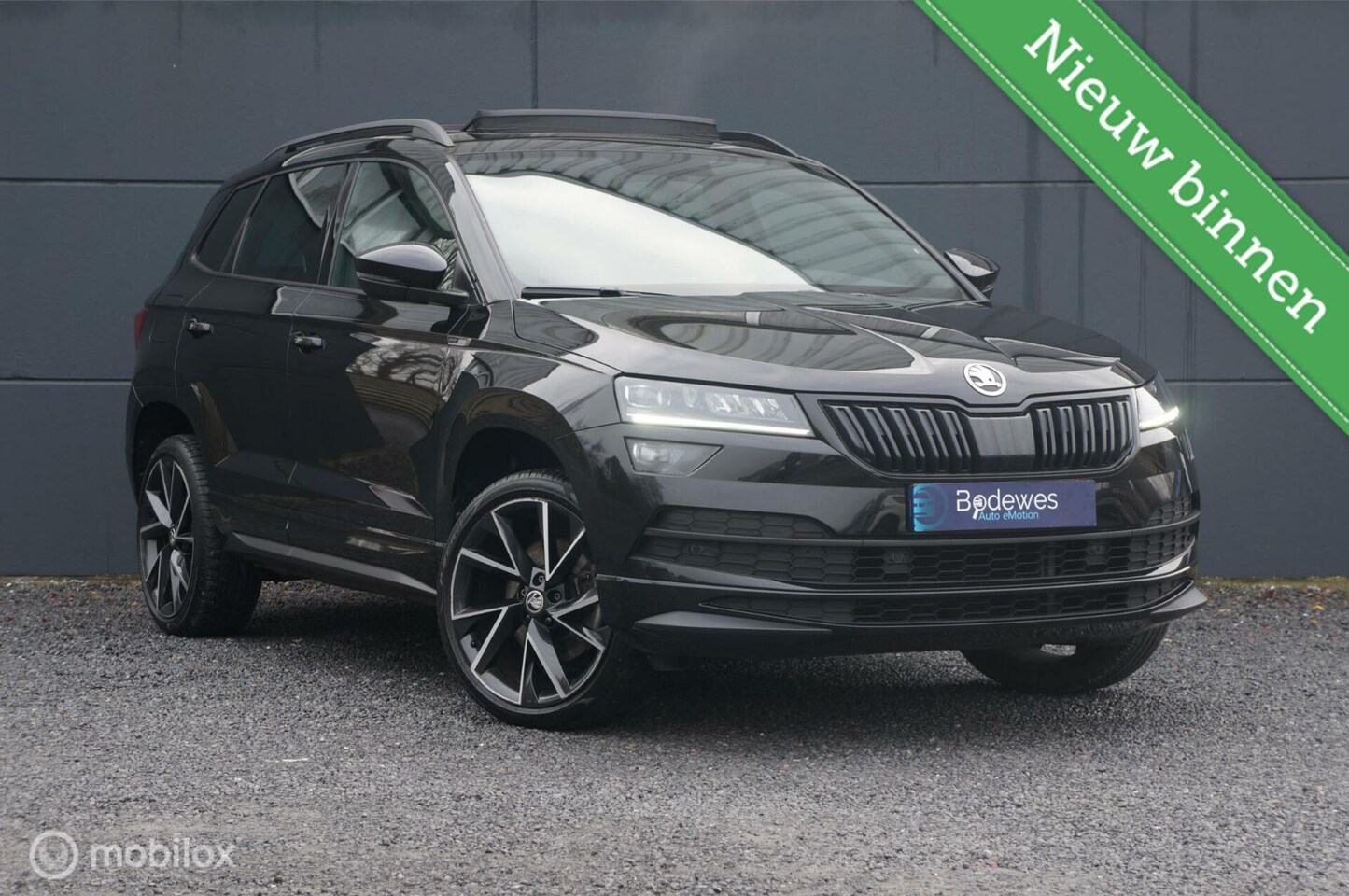 Skoda Karoq - 1.5 TSI ACT DSG Sportline Bns Pano Android/Apple - AutoWereld.nl