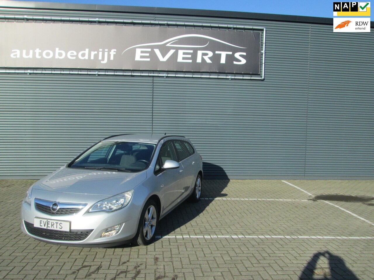 Opel Astra Sports Tourer - 1.4 Turbo Edition zeer nette auto nu scherpe export prijs koppeling matig - AutoWereld.nl