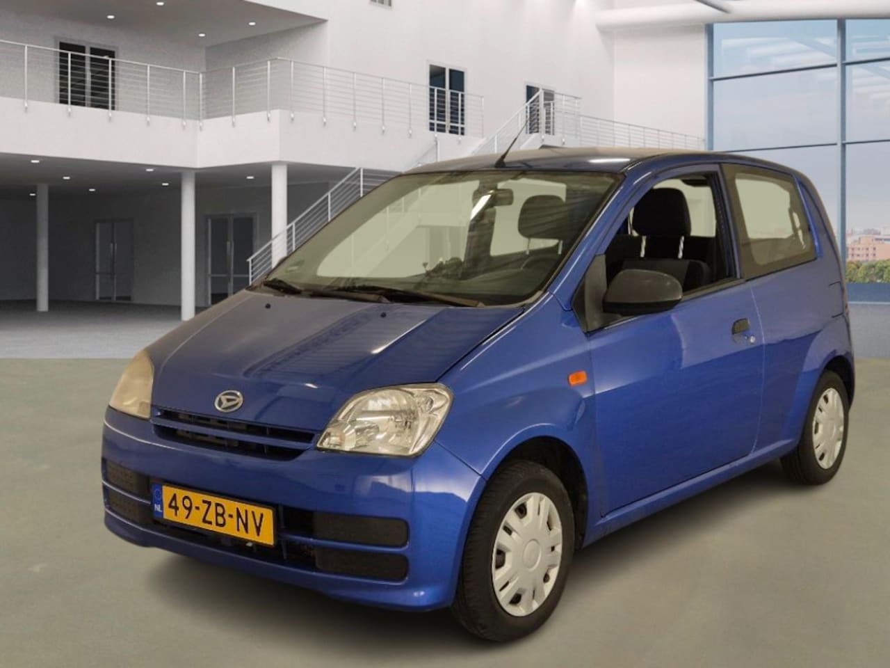 Daihatsu Cuore - 1.0-12V 100th Anniversary/ZEER ZUINIG - AutoWereld.nl