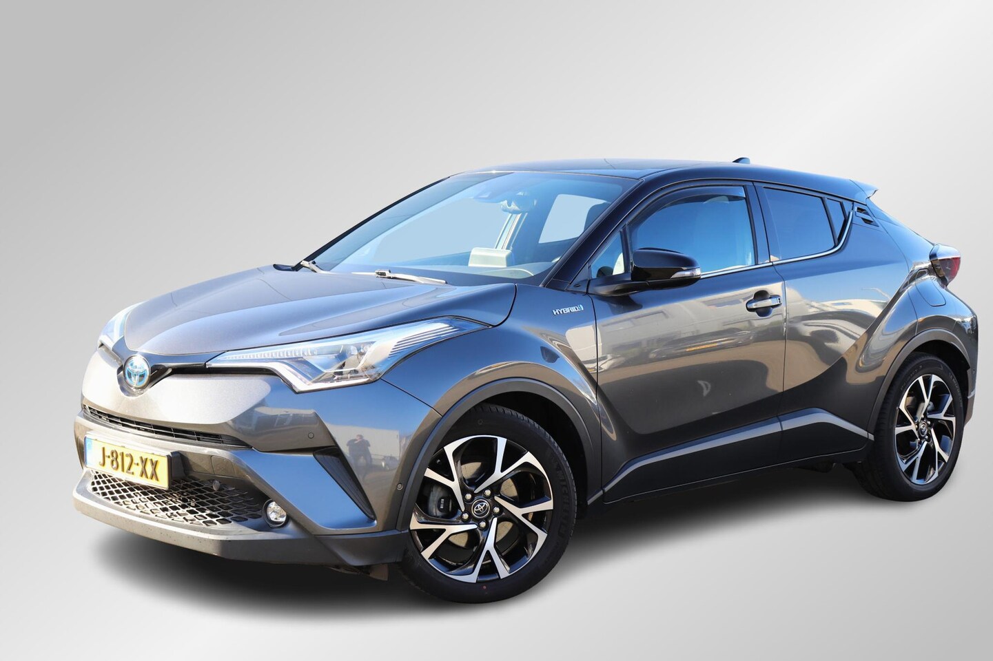 Toyota C-HR - 1.8 Hybrid Bi-Tone Dodehoek-JBL-Navi - AutoWereld.nl