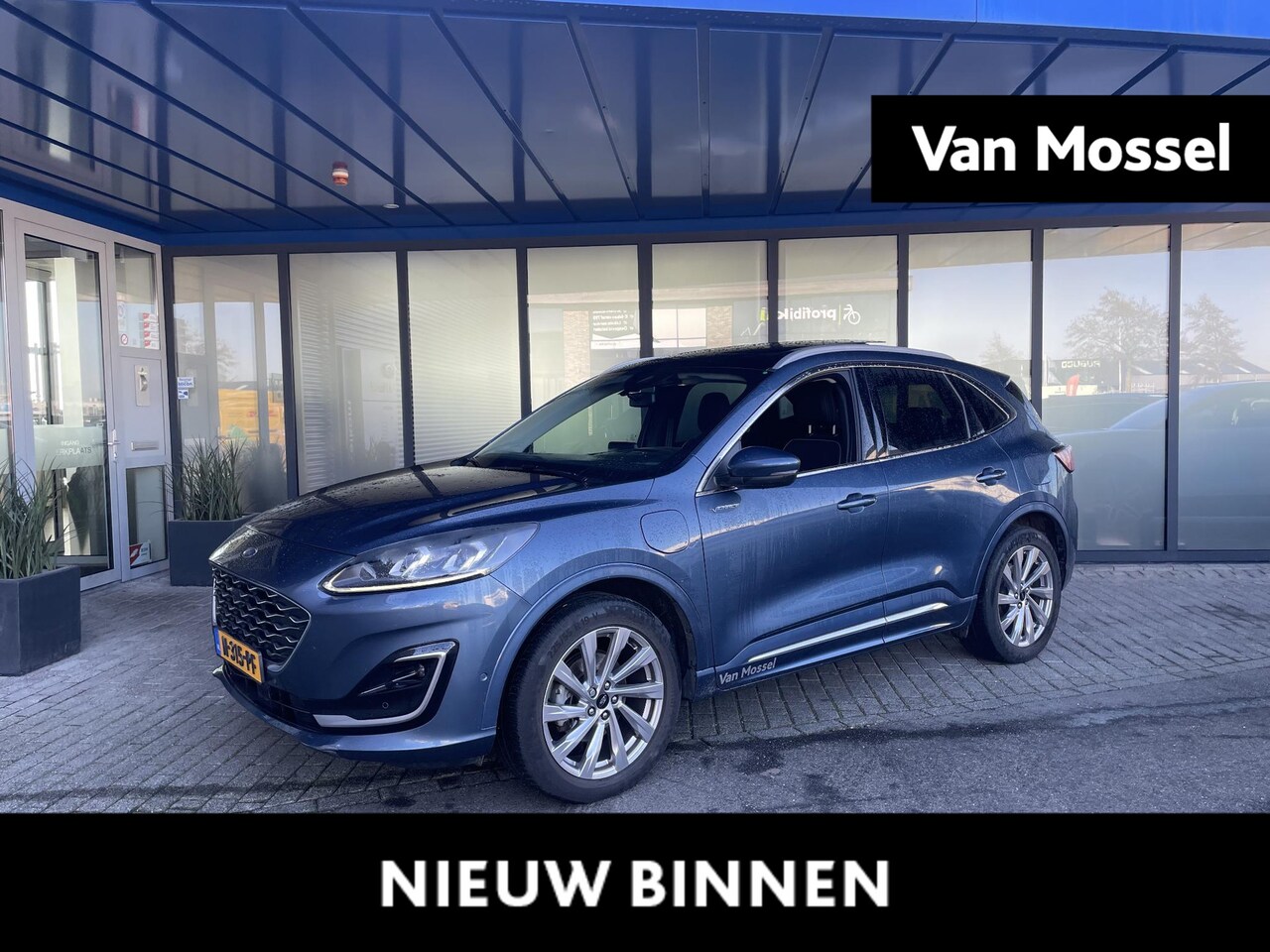 Ford Kuga - 2.5 PHEV Vignale Ford Kuga 2.5 PHEV ST-Line X - AutoWereld.nl