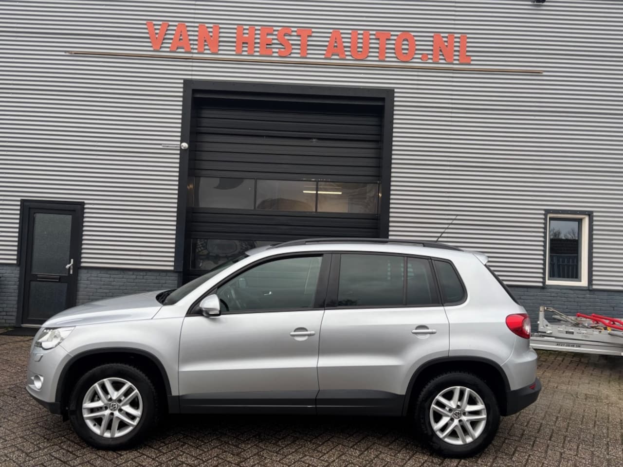 Volkswagen Tiguan - 1.4 TSI Sport&Style | 3 MND GAR | NAVI | CLIMA | LMV | CRUISE CO - AutoWereld.nl