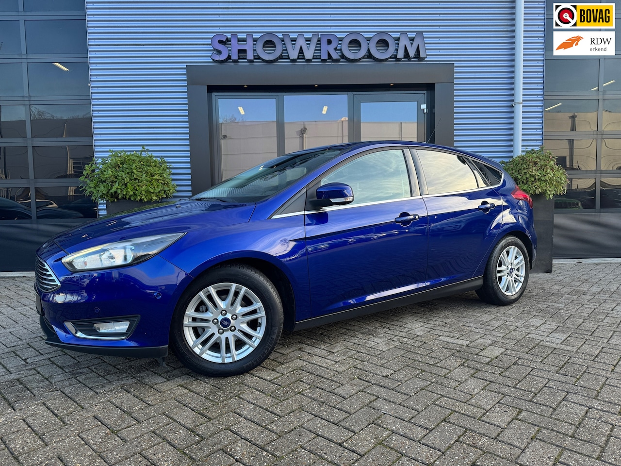 Ford Focus - 1.0 Titanium Edition 125PK|Cruise|Start/Stop|Dodehoek|Trekhaak - AutoWereld.nl