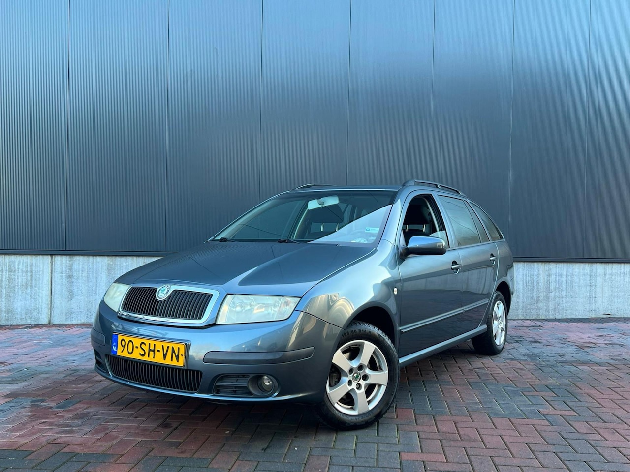 Skoda Fabia Combi - 1.4-16V Elegance * Cruise * Climate * Trekhaak - AutoWereld.nl