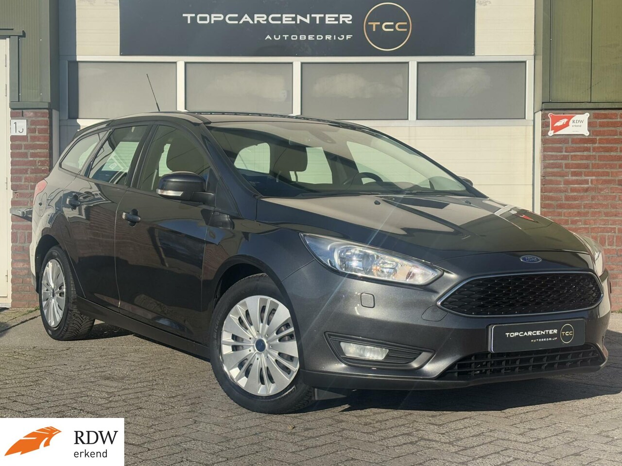 Ford Focus Wagon - 1.0 Titanium Edition/STOELV/CRUISE/NAVI/APK - AutoWereld.nl