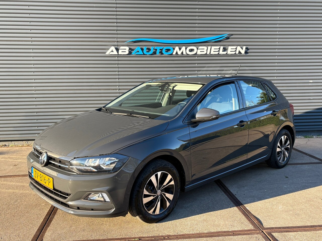 Volkswagen Polo - 1.0 TSI Comfortline Business PARKEER-SENSOREN/ TREKHAAK - AutoWereld.nl