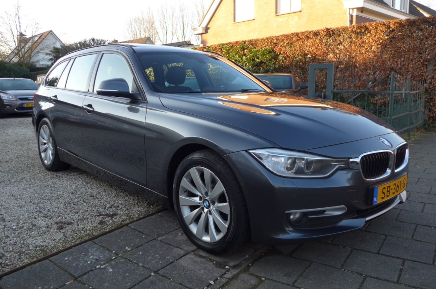 BMW 3-serie Touring - 320d High Executive Pano Half leder - AutoWereld.nl