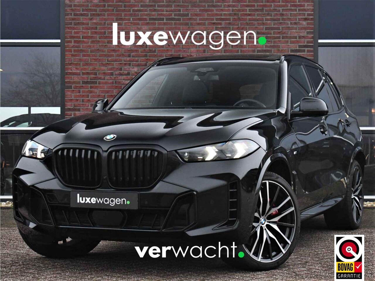 BMW X5 - xDrive50e M-Sport Pro Pano Comfstoel ACC 22inch Softclose - AutoWereld.nl