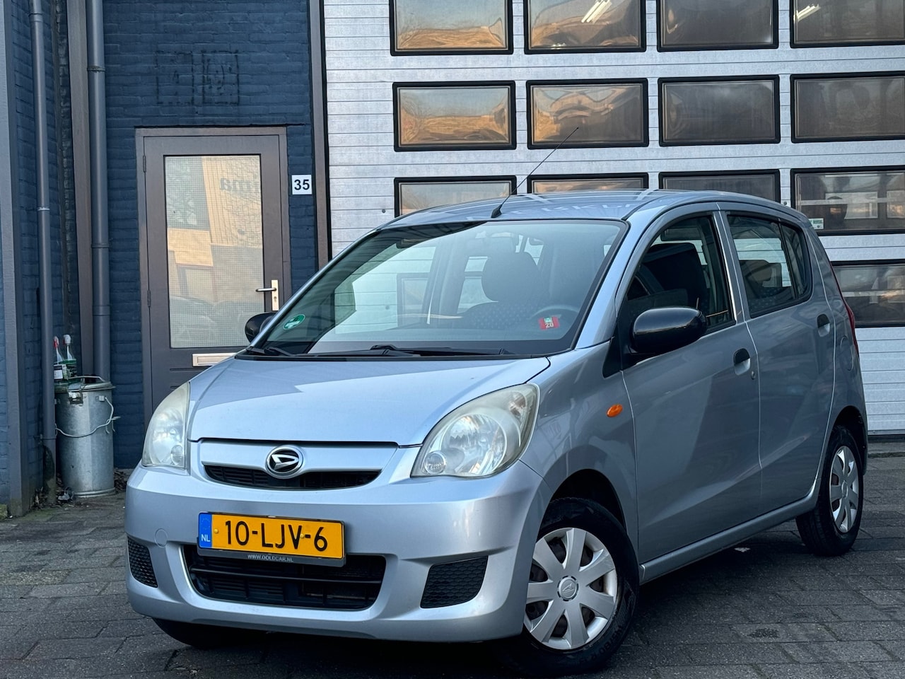 Daihatsu Cuore - 1.0 Comfort | Airco | Stuurbekr | N.A.P - AutoWereld.nl