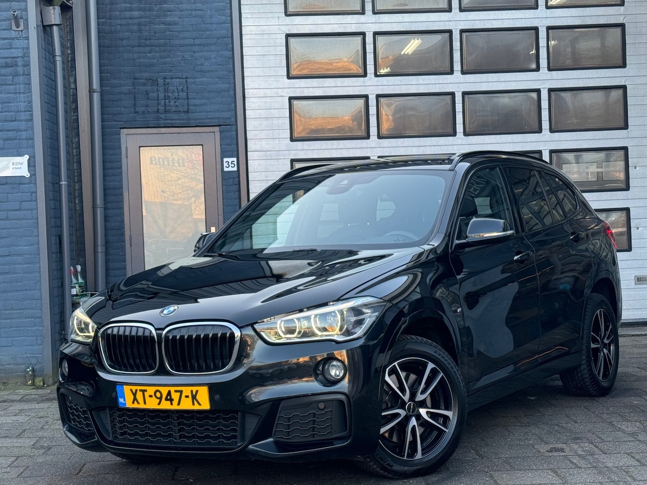 BMW X1 - SDrive20d High Executive | Clima | Navi | Automaat | M-Pakket - AutoWereld.nl