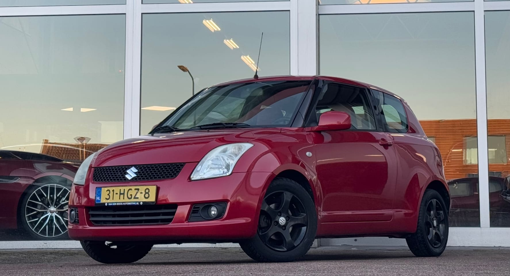 Suzuki Swift - 1.5i 16V Exclusive Lerenbekleding Garantie - AutoWereld.nl