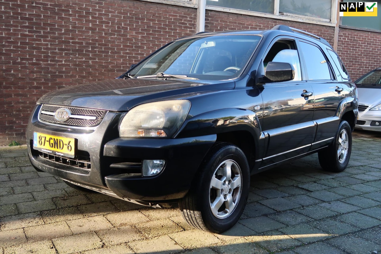 Kia Sportage - 2.0 CVVT All Stars 2.0 CVVT All Stars, AIRCO, Trekhaak, LM Velgen, Cruise control, 4 elektrische ramen+ spieg - AutoWereld.nl