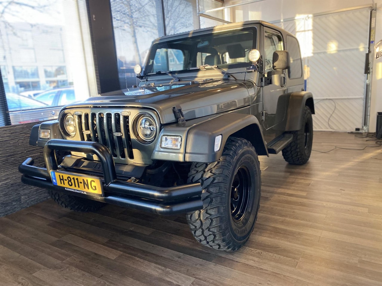 Jeep Wrangler - 4.0i Hardtop custom automaat airco - AutoWereld.nl