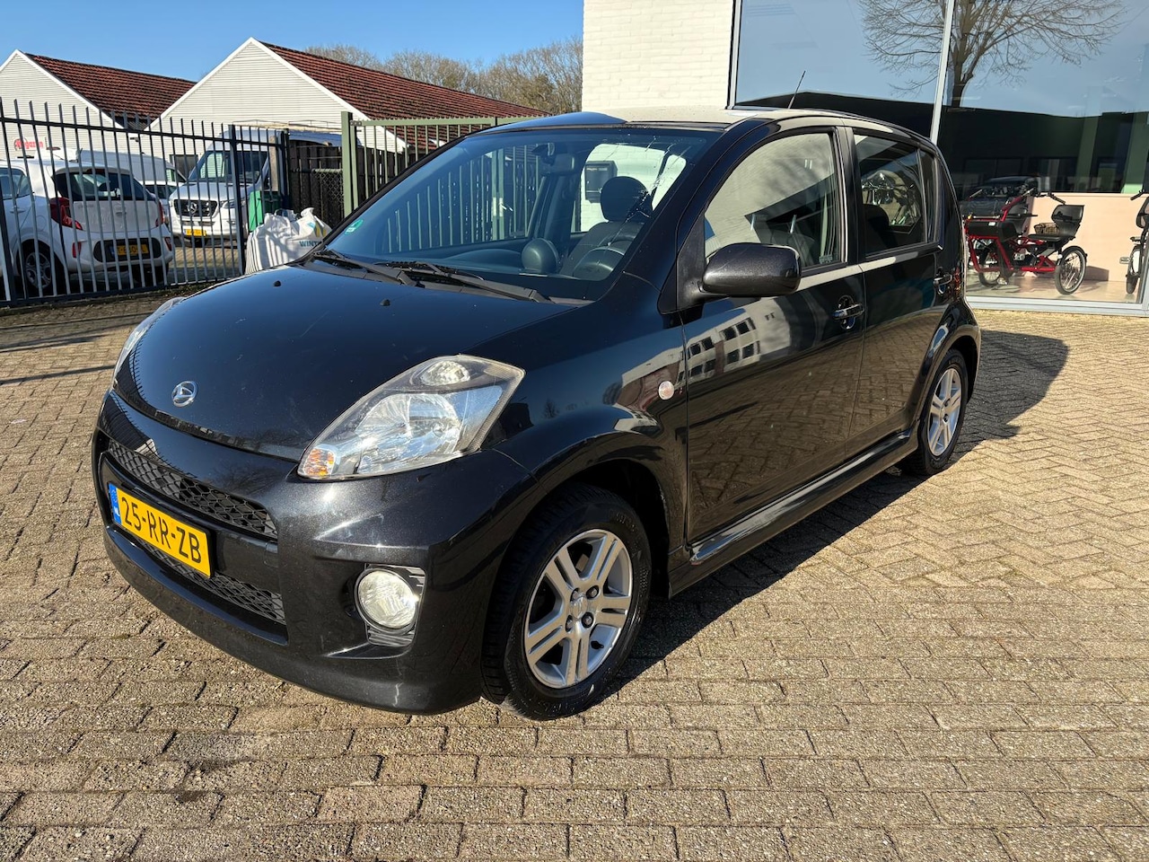 Daihatsu Sirion 2 - 1.3-16V Comfort Daihatsu Sirion Sport 1.3 16V - AutoWereld.nl