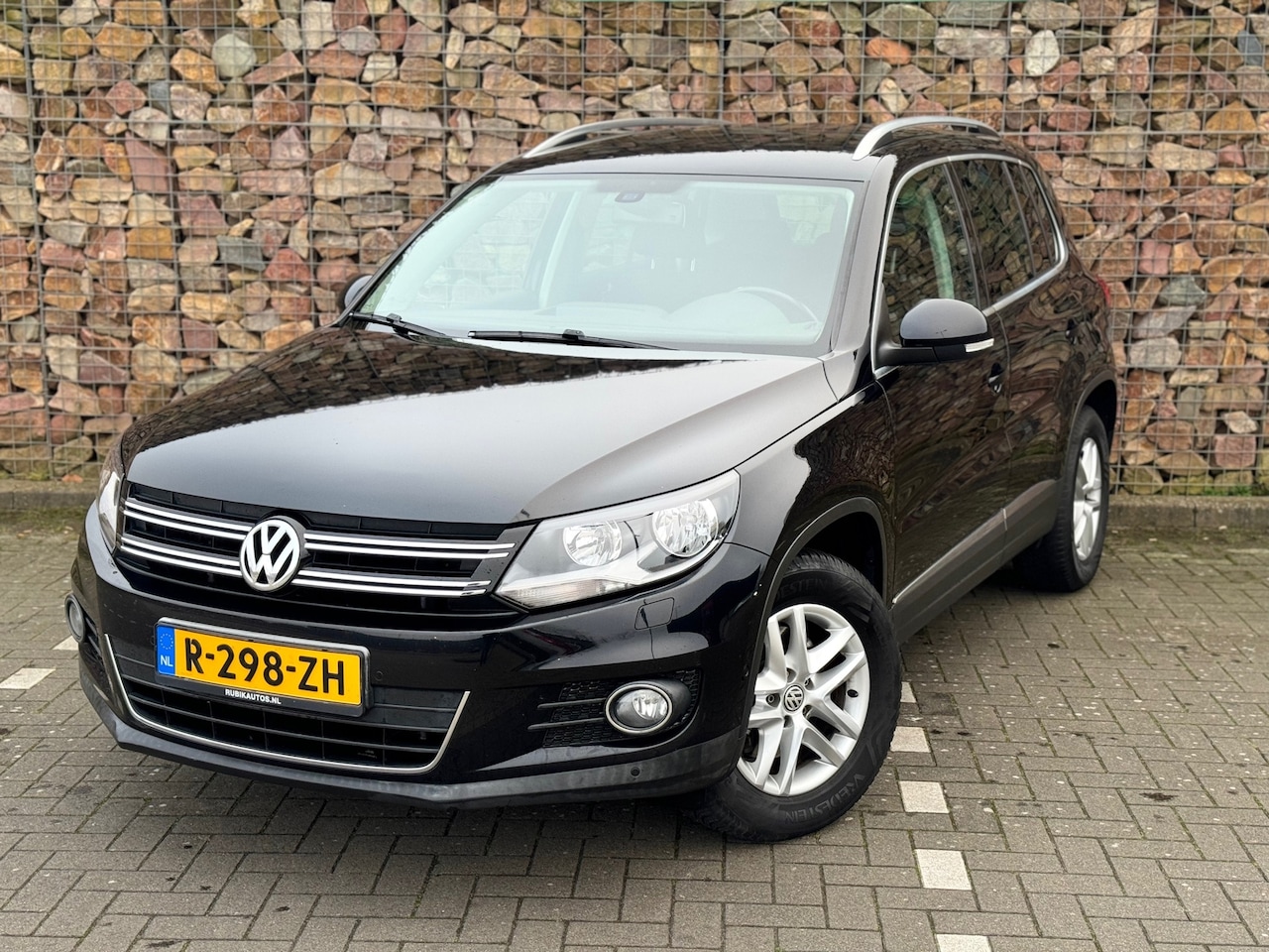 Volkswagen Tiguan - 1.4 TSI Sport&Style - AutoWereld.nl