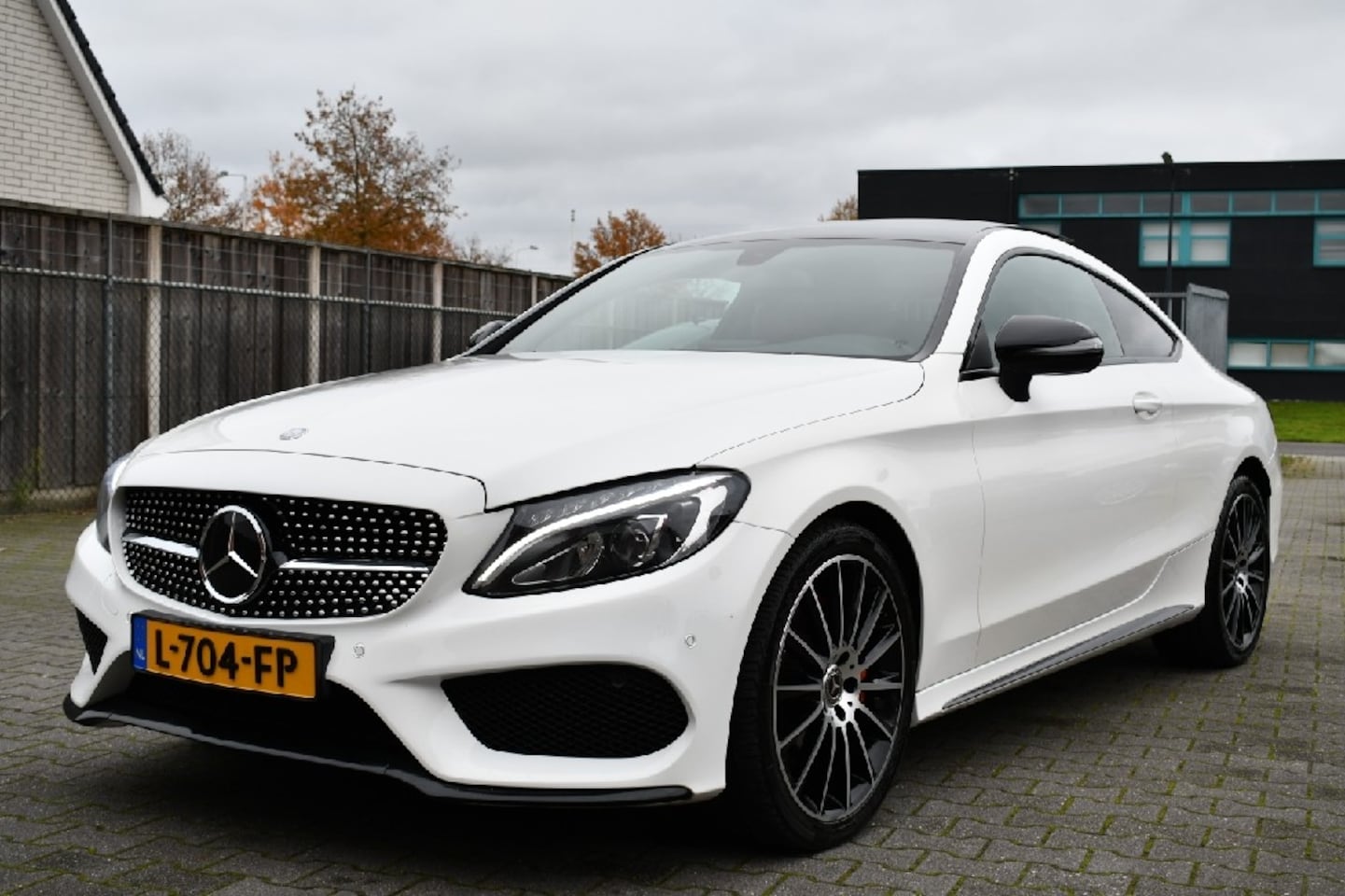 Mercedes-Benz C-klasse Coupé - 220d AMG Panodak|Keyless|19" - AutoWereld.nl