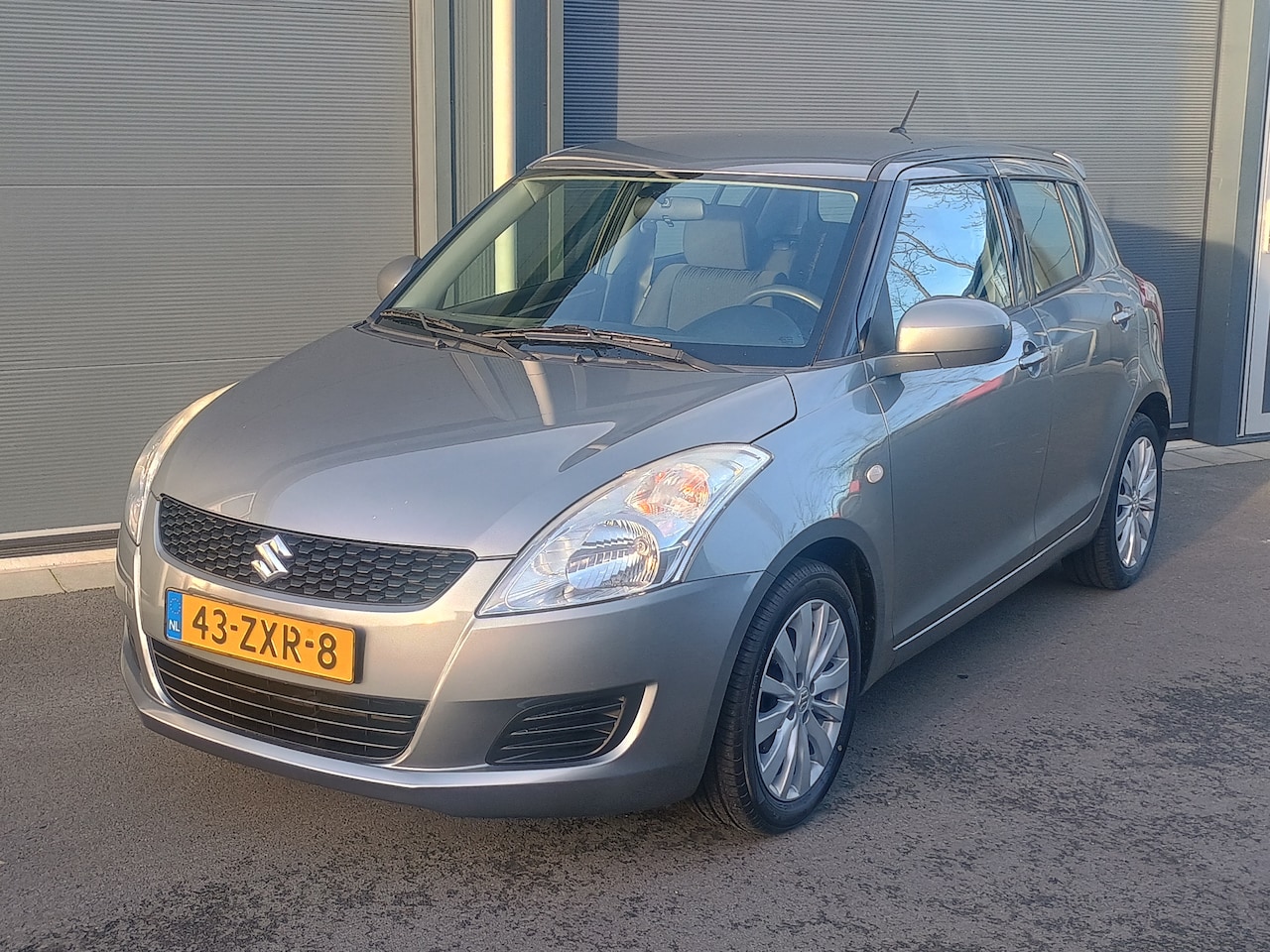 Suzuki Swift - 1.2 Bandit EASSS - AutoWereld.nl