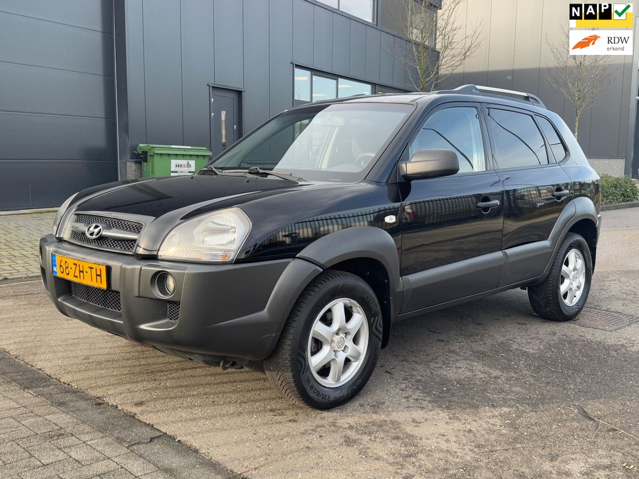 Hyundai Tucson - 2.0 CRDi Dynamic 6-BAK/AIRCO - AutoWereld.nl