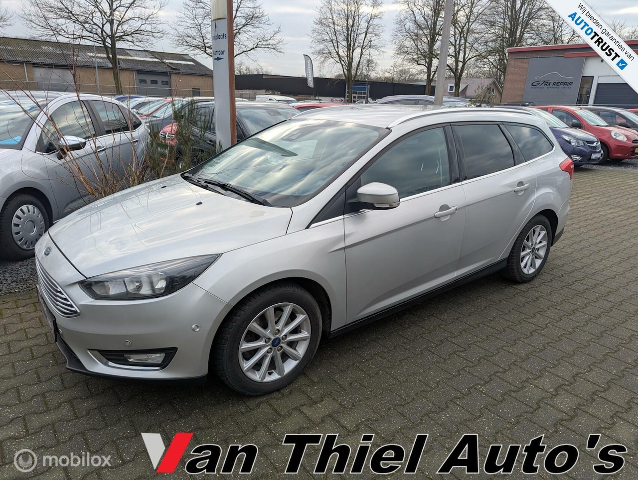 Ford Focus Wagon - 1.5 zilver Edition navi cruis - AutoWereld.nl