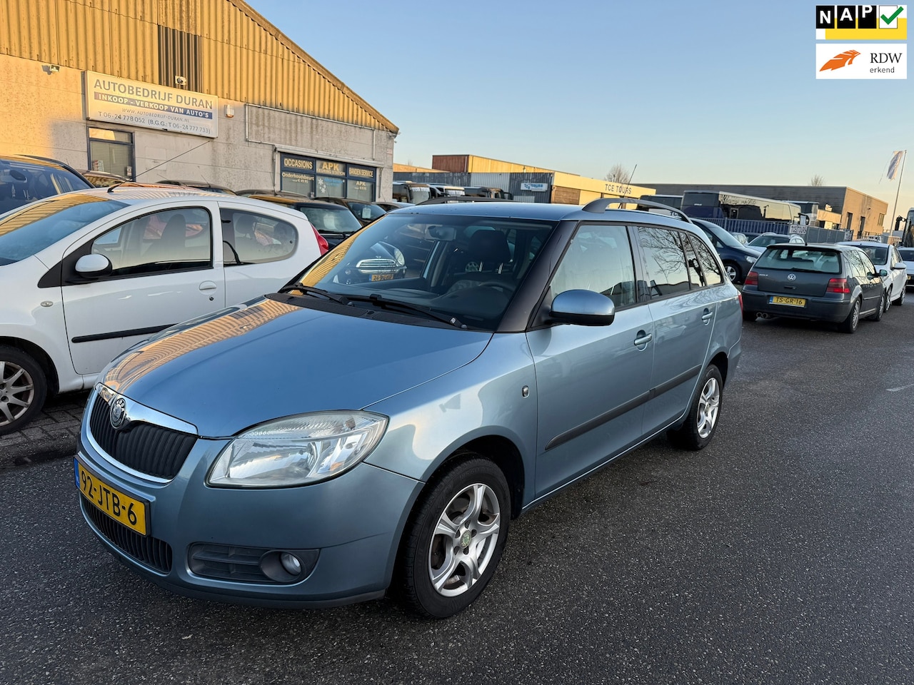 Skoda Fabia Combi - 1.4-16V Tour NAV.+ Clima Bj:2009 NAP! - AutoWereld.nl