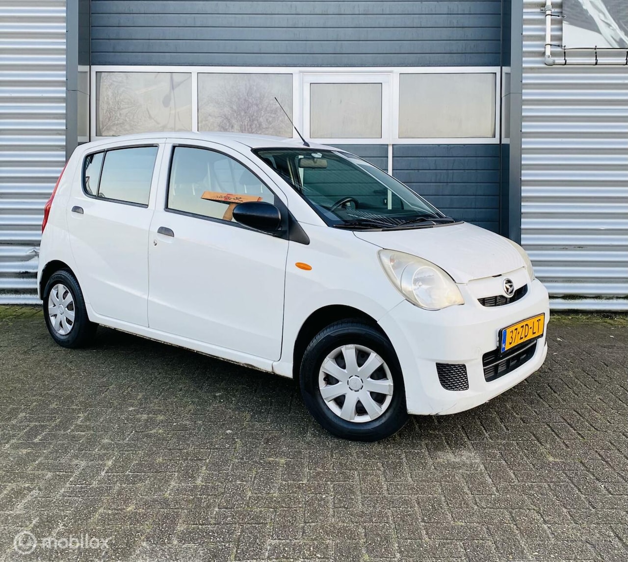 Daihatsu Cuore - 1.0 Trend 5 Deurs|APK 11-2025|Nwe Banden| - AutoWereld.nl