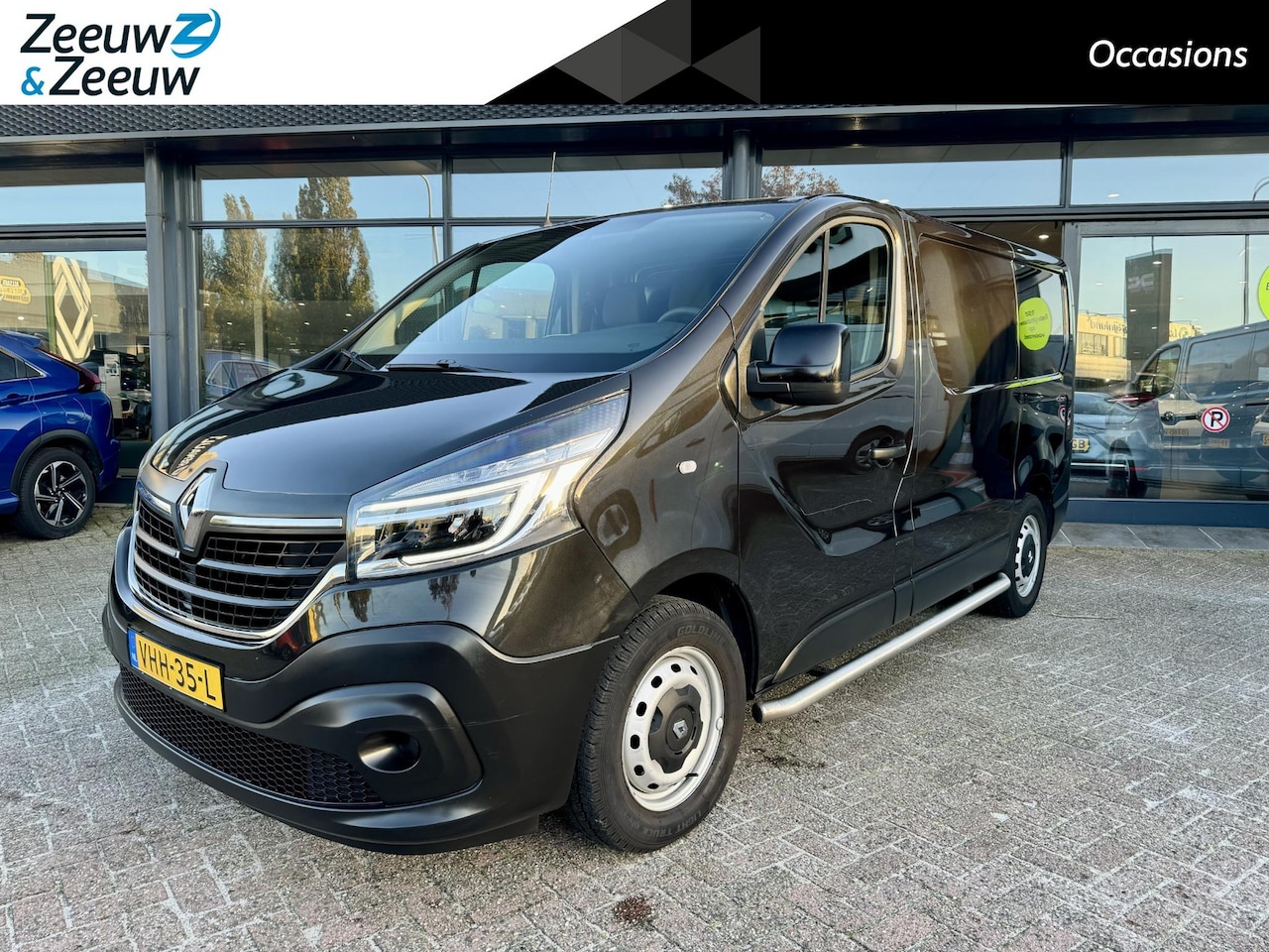 Renault Trafic - 1.6 dCi 95 T27 L1H1 Comfort | Vloerplaat | Airco | Camera | Sidebars | 3 Pers. | Alarm kla - AutoWereld.nl