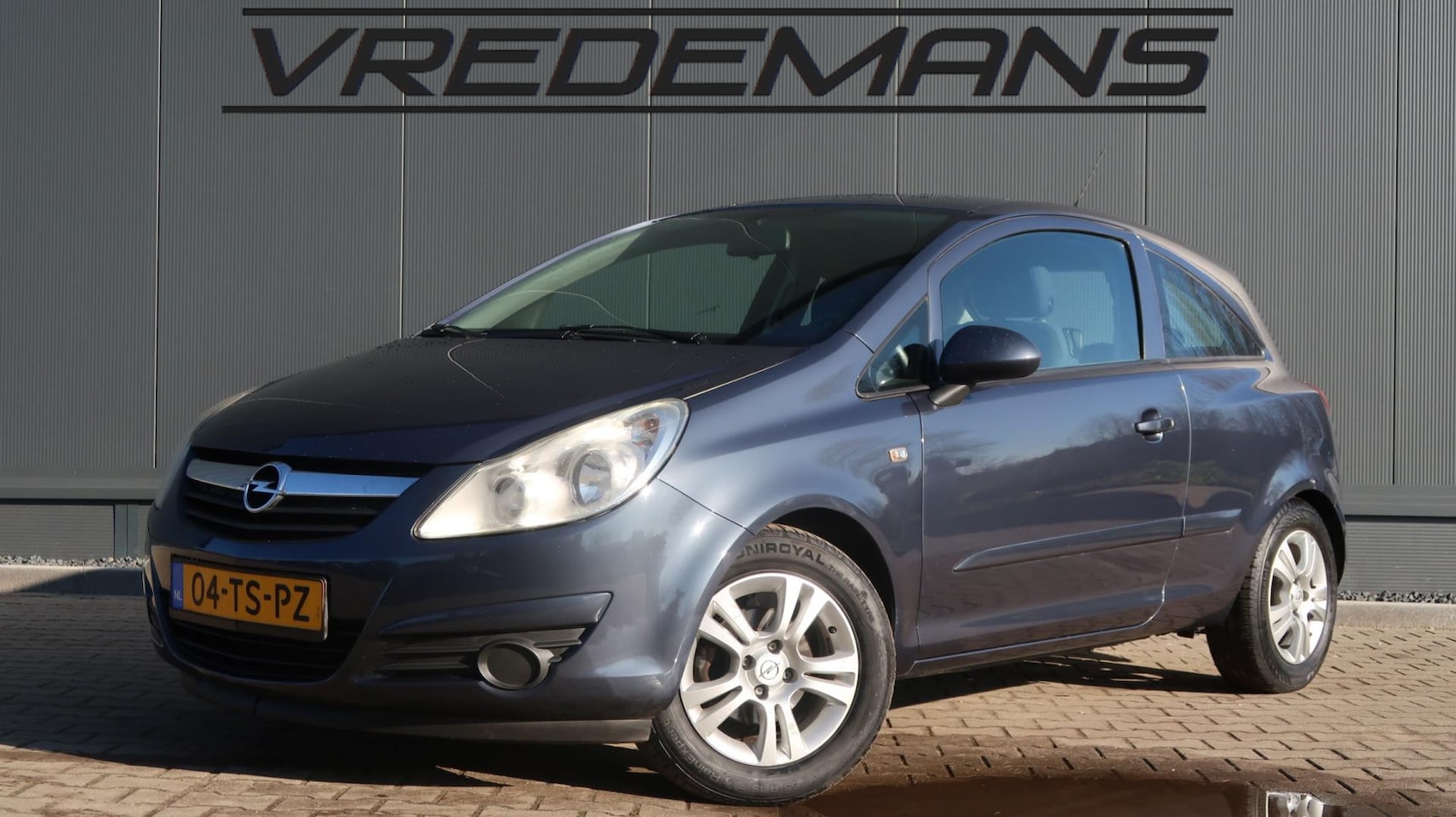 Opel Corsa - 1.4-16V Enjoy AUTOMAAT - AutoWereld.nl