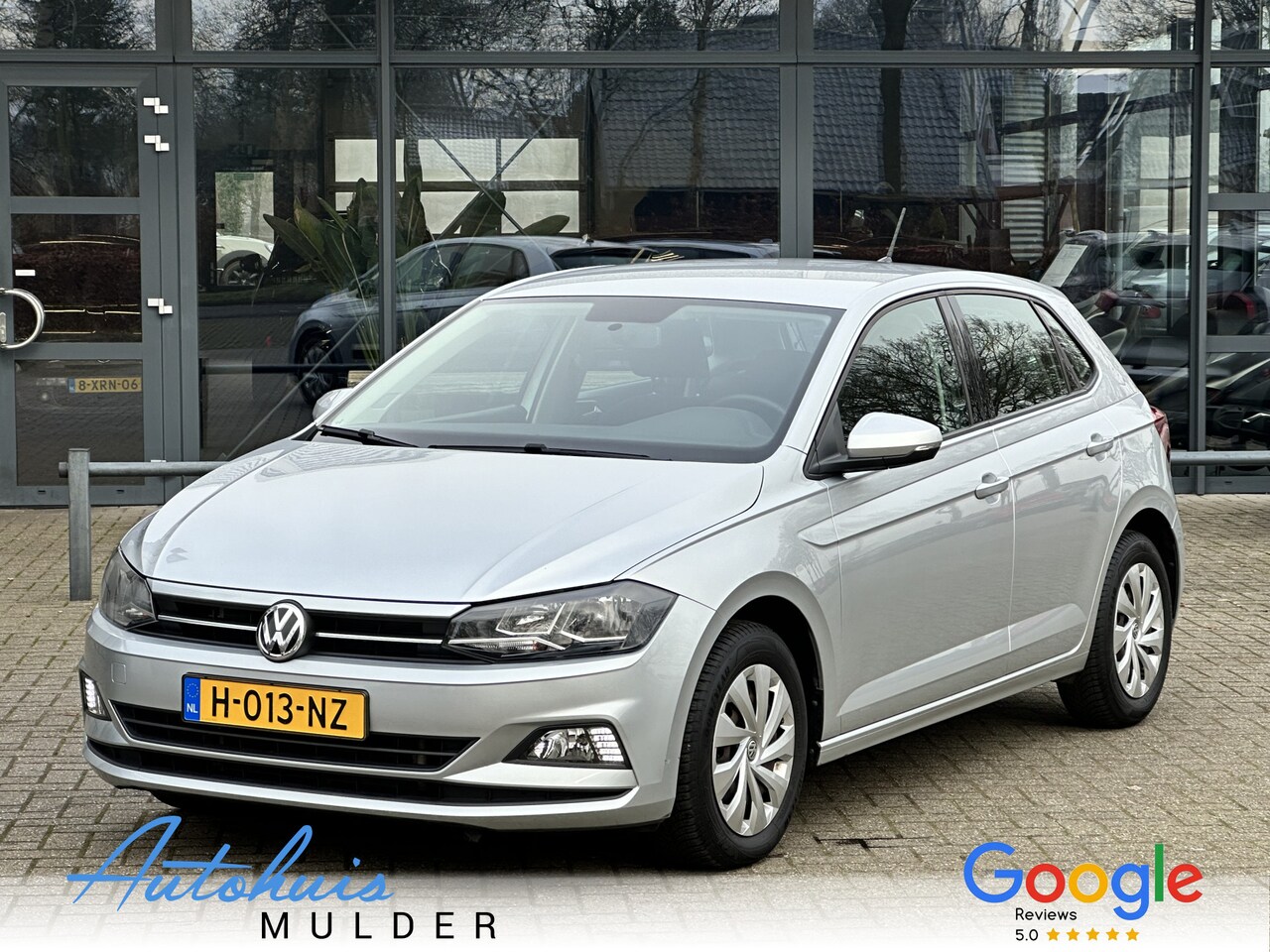 Volkswagen Polo - 1.0 TSI Comfortline Automaat/Airco/Cruise/Navigatie - AutoWereld.nl