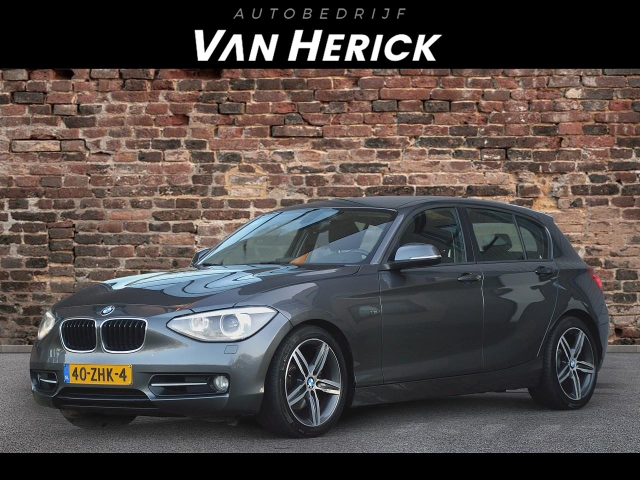 BMW 1-serie - 118i Business Automaat | Xenon | Cruise | Groot Scherm | Clima - AutoWereld.nl