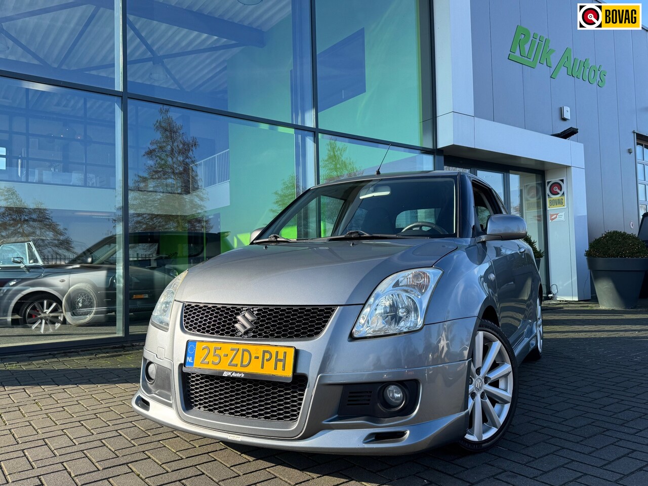 Suzuki Swift - 1.6 Sport * Cruise Control * Carplay * Airco * 17 Inch - AutoWereld.nl