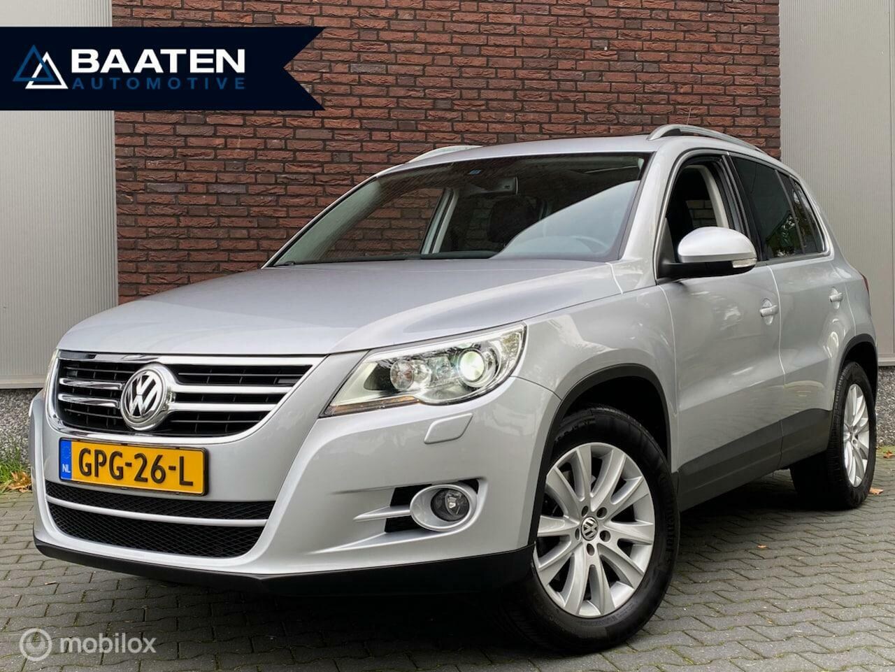 Volkswagen Tiguan - 1.4 TSI Sport&Style 4Motion |Leder|Pano|Trekhaak|Camera|Navi|Xenon|Youngtimer| - AutoWereld.nl