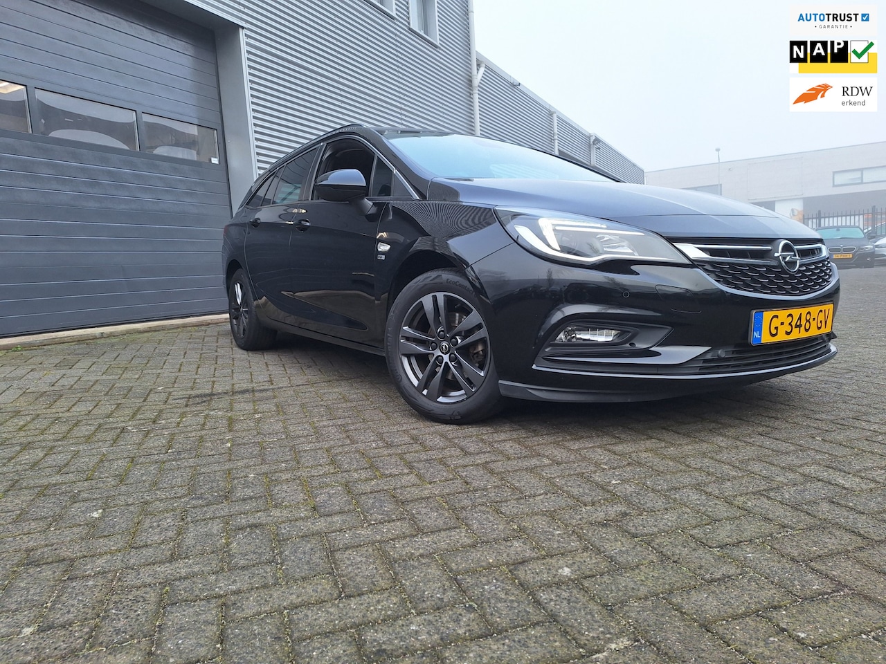 Opel Astra Sports Tourer - 1.0 Turbo 120 Jaar Edition Navigatie Ecc Pdc V/A Enz - AutoWereld.nl