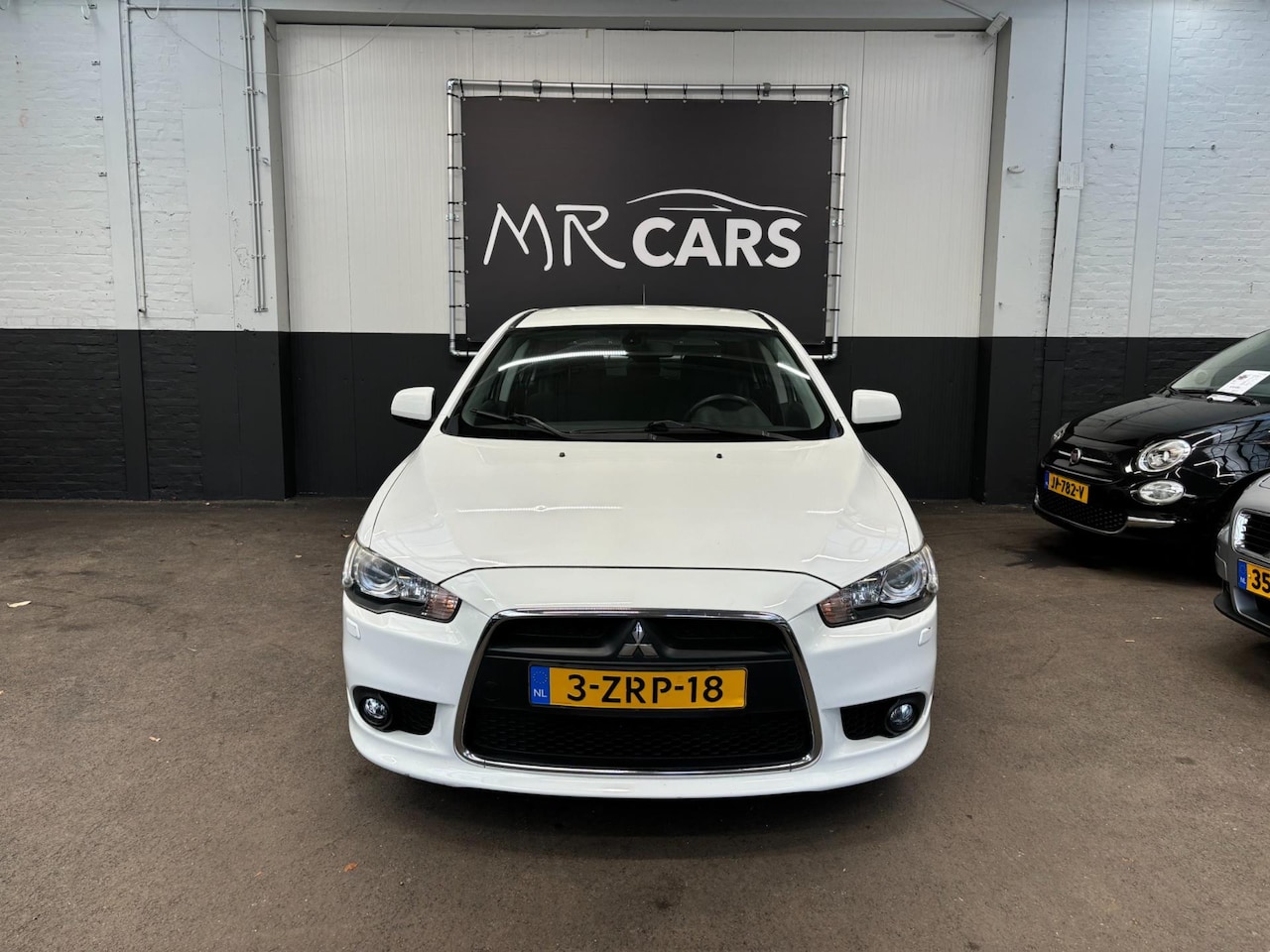 Mitsubishi Lancer Sportback - 1.6 Edition One Airco - AutoWereld.nl