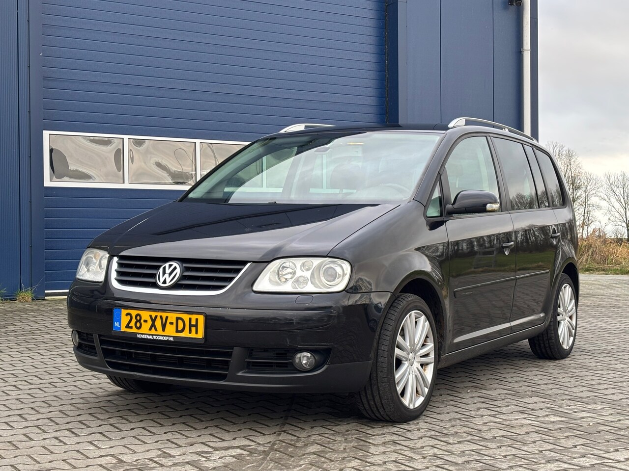 Volkswagen Touran - 2.0 TDI Trendline Automaat 7-PERSONEN - AutoWereld.nl