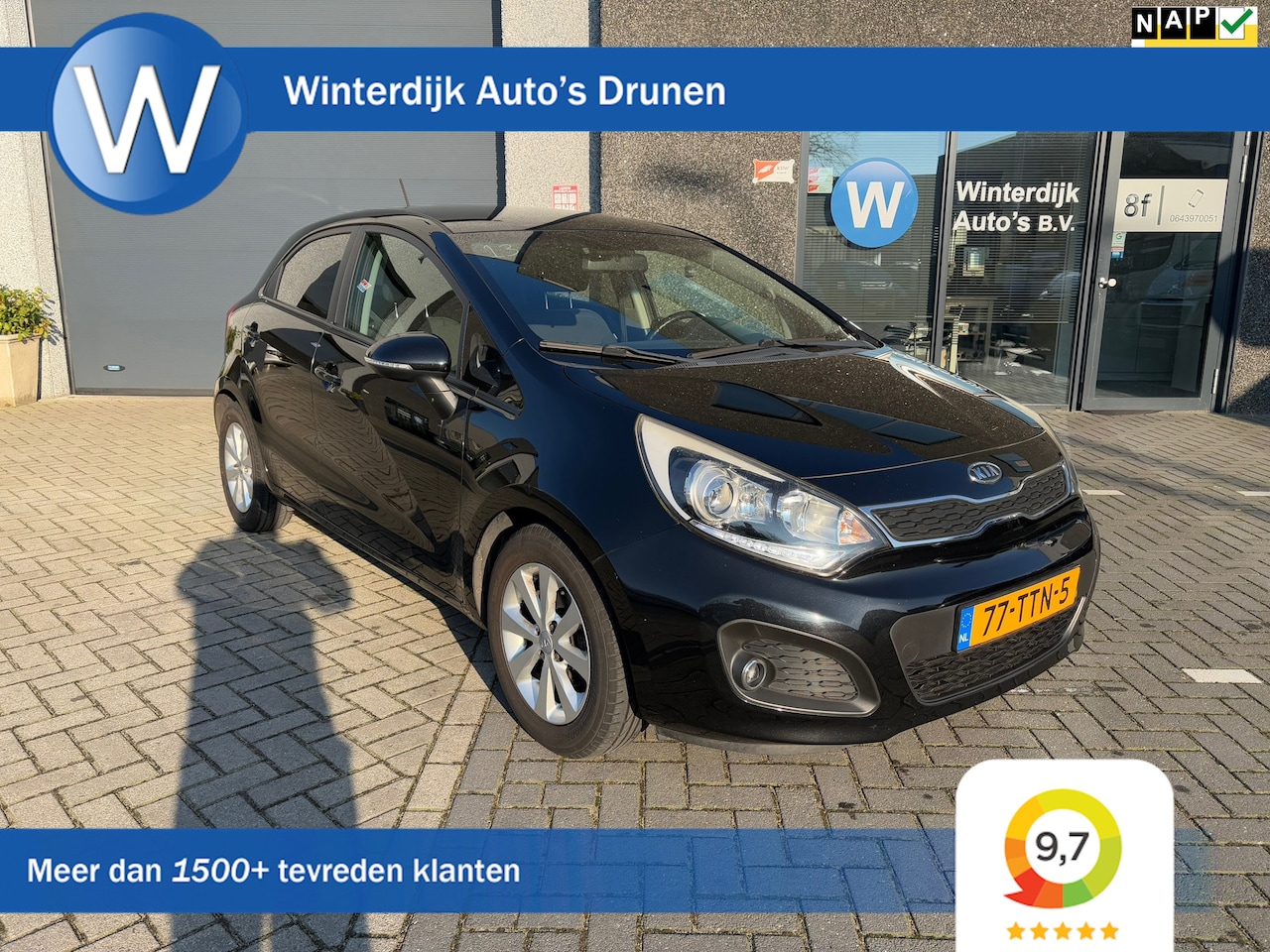 Kia Rio - 1.2 CVVT Super Pack Clima, Cruise, Camera, Navi, Nap - AutoWereld.nl