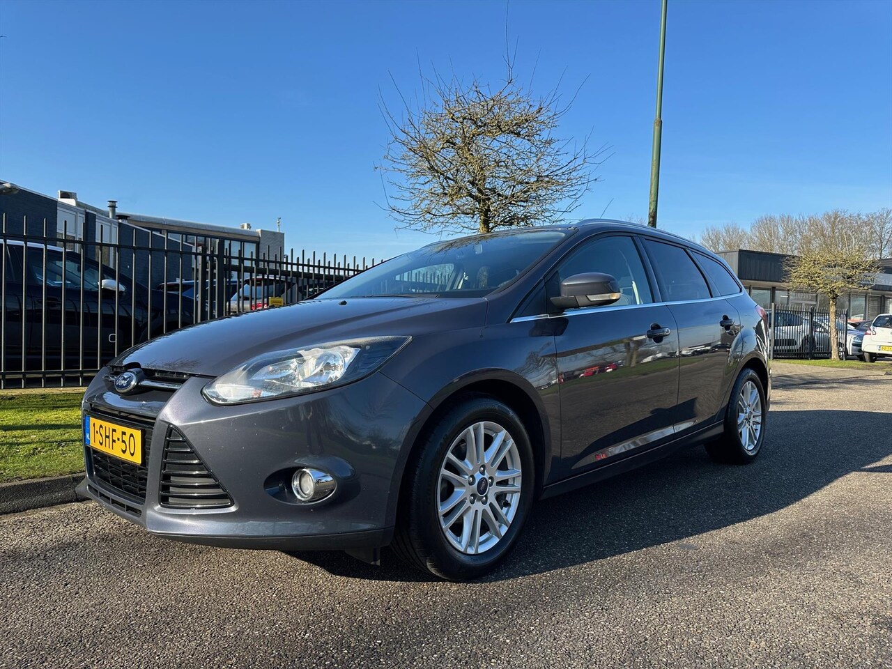 Ford Focus - 1.0 EcoBoost 125pk Titanium Trekhaak Navigatie - AutoWereld.nl