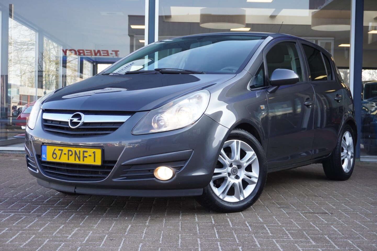 Opel Corsa - 1.4-16V Cosmo | 5deurs | Airco | Elek. pakket | Grijs | Inruil mogelijk - AutoWereld.nl