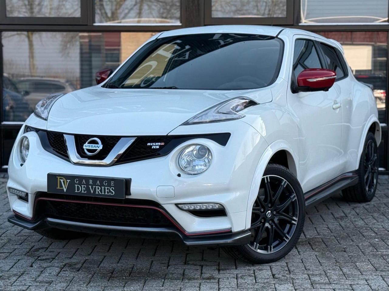 Nissan Juke - 1.6 DIG-T Nismo RS 218pk Parelmoer Alcantara Full Option Garantie - AutoWereld.nl